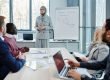 Woman presenting at a strategy meeting