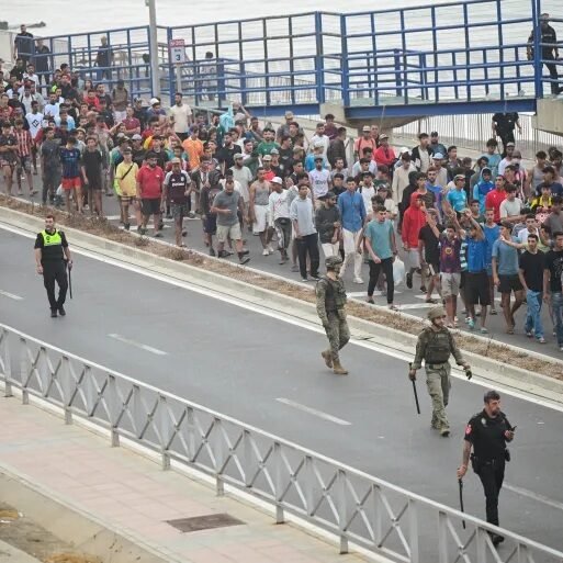 Up to 9,000 migrants remain in Spain’s African enclave after 72,000 crossed from Morocco